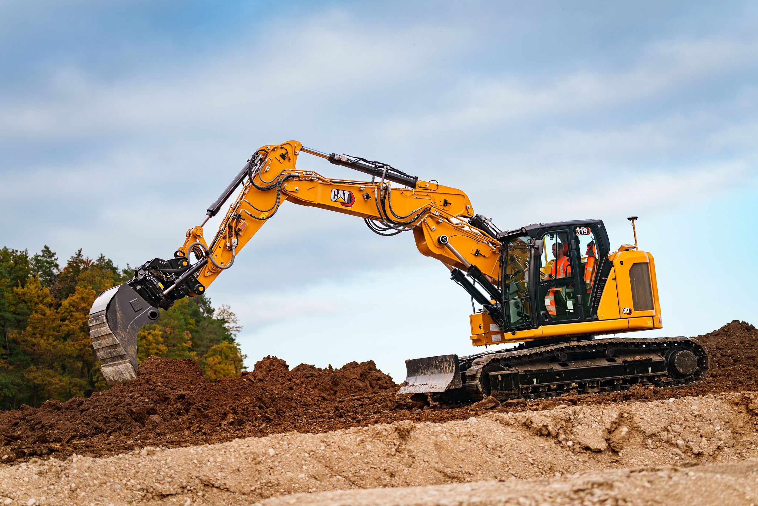 Caterpillar unveils Cat 319 and D8 XE